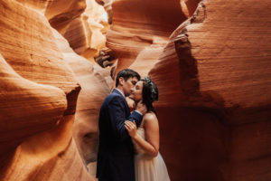 bride and groom eloping in antelope canyon in page, arizona
