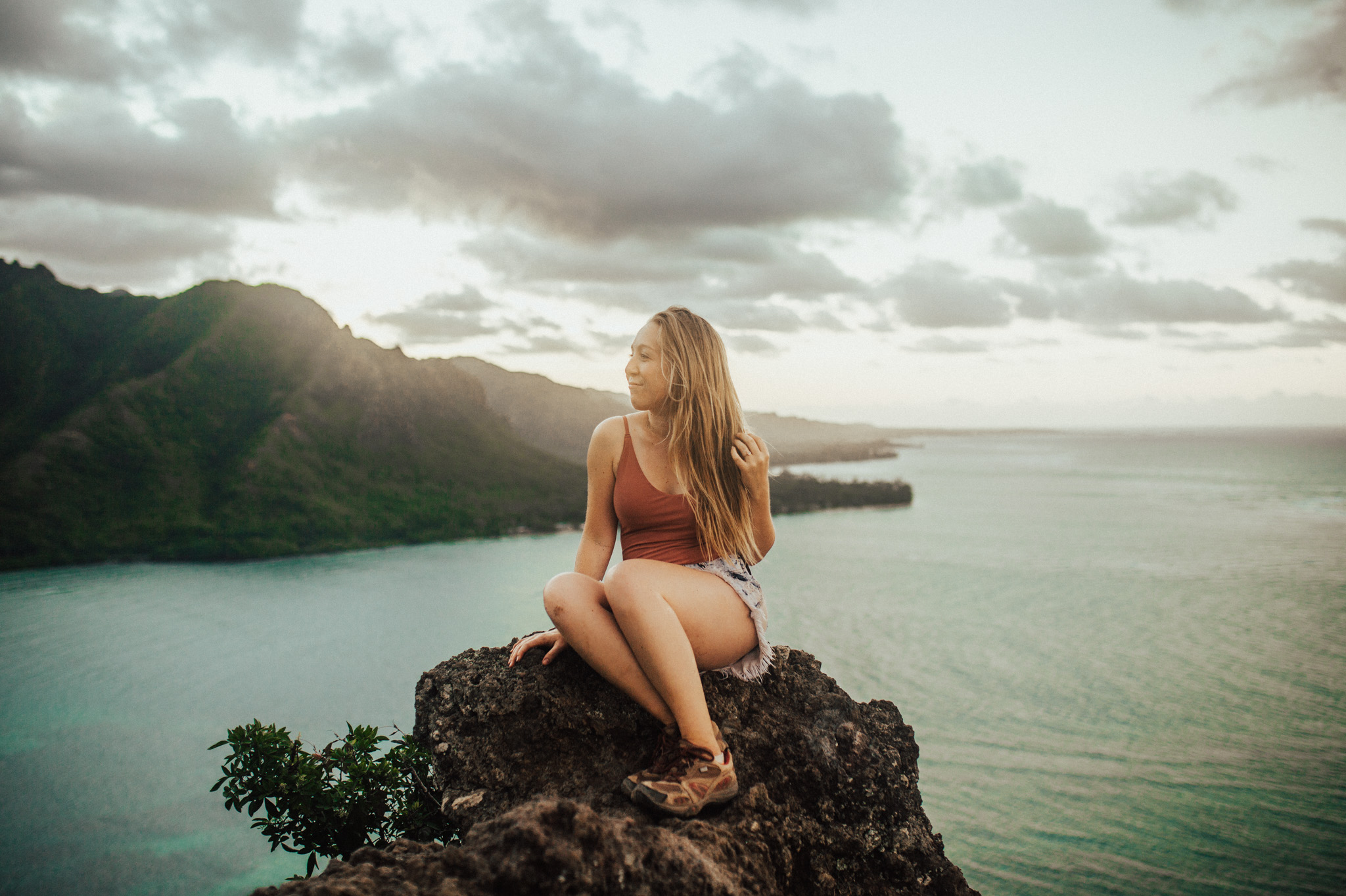 Lindsey Roman on top of a mountain