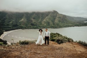 Bride and groom eloping in the mountains in Oahu, Hawaii.