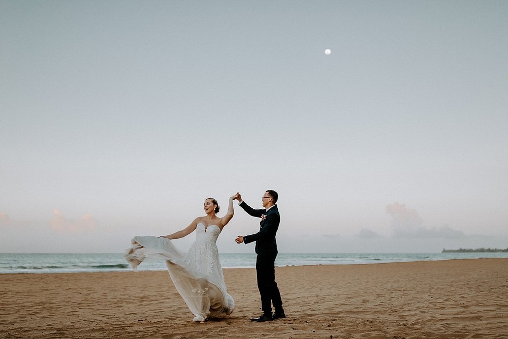 bride and groom on beach in Puerto Rico